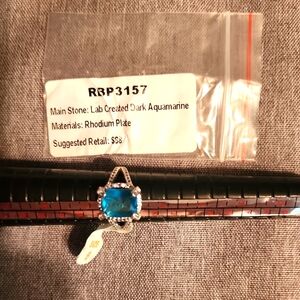 Lab Created Dark Aquamarine Rhodium Plated Ring Bomb Party